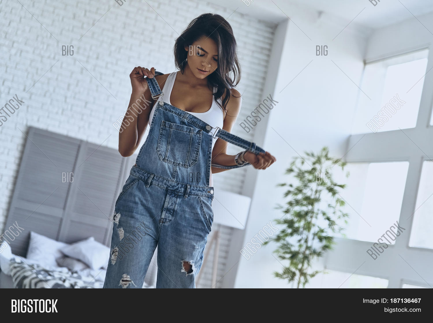 adolf manginsela add Woman Taking Her Clothes Off photo