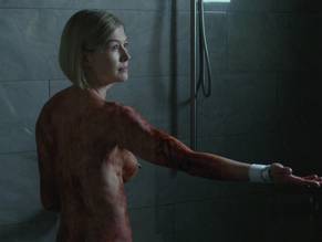 bode owolabi add Rosamund Pike Toppless photo